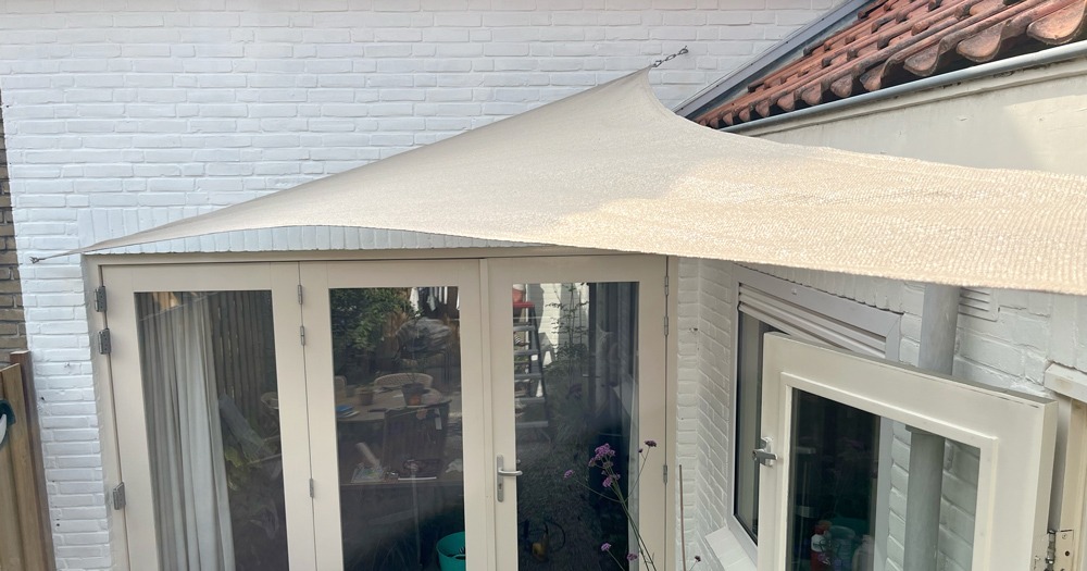 schaduwdoek ophangen